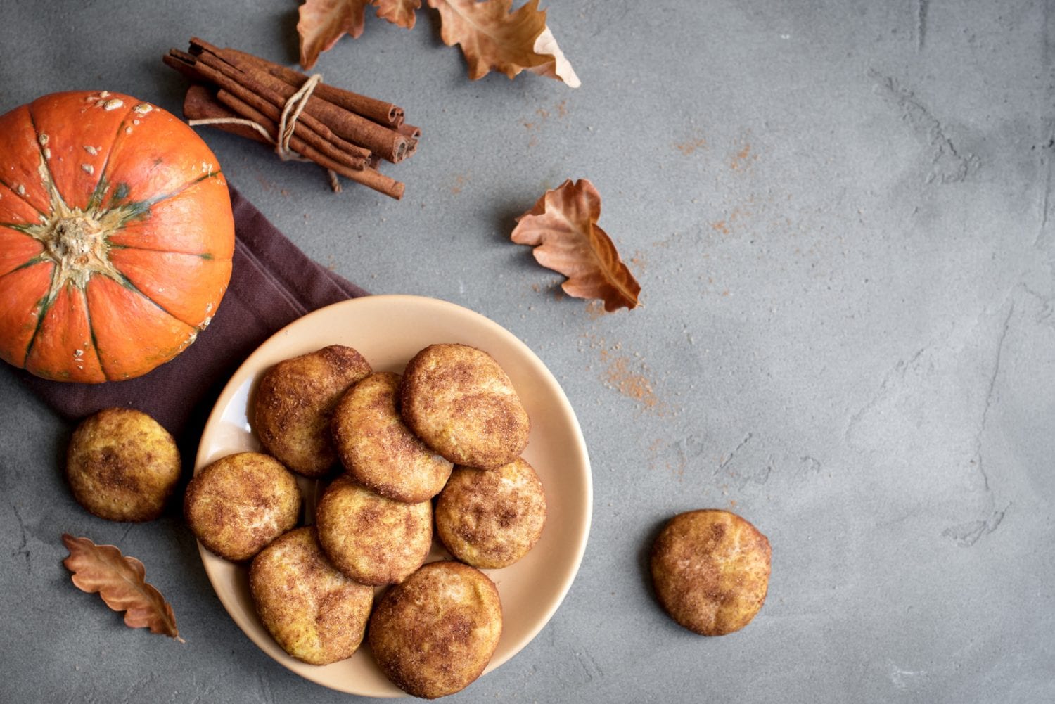 Weed Pumpkin Snickerdoodle Cookies. Seasonal Autumn Homemade Cookies, top view, copy space. Traditional desert Snickerdoodles for Autumn.