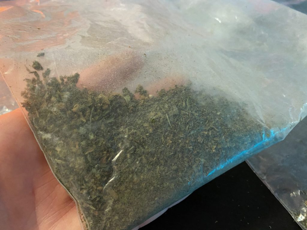 a large amount of shake in the corner of a ziplock bag